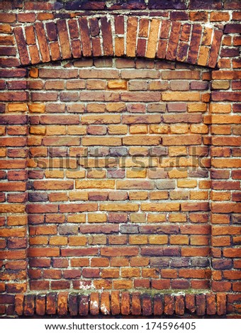 Recess arch frame in old brick wall