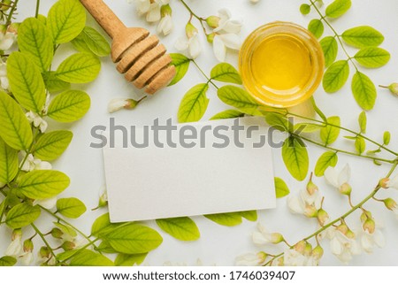 business card with with acacia flowers. ad card