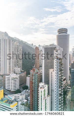 The amazing view of Hong-Kong cityscape full of skyscrapers from the rooftop.