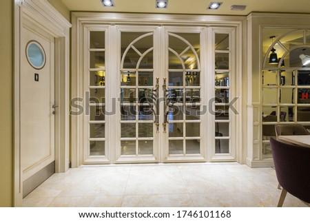 Entrance door in modern hotel restaurant 
