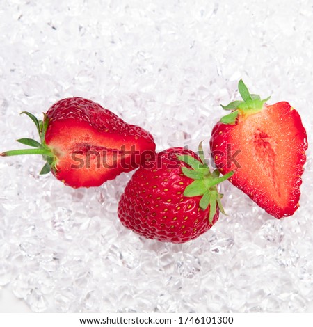 fresh strawberry on ice cubes