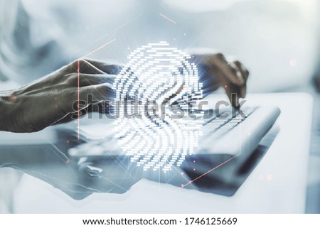 Multi exposure of creative fingerprint hologram with hands typing on computer keyboard on background, personal biometric data concept