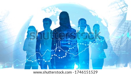 Diverse business team working in blurry abstract city with double exposure of planet hologram and financial chart. Toned image. Elements of this image furnished by NASA