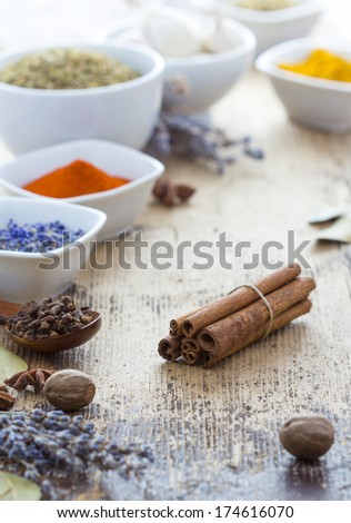 Spices on wooden table. Rustic