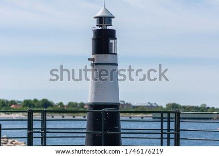 Small tower to signal vessels going into the West harbour marina in Malmö, Sweden