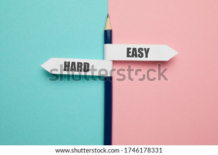Pencil - direction indicator - choice of hard or easy. Royalty-Free Stock Photo #1746178331