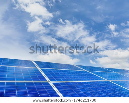 Solar plant(solar cell) with the cloud on sky, hot climate causes increased power production, Alternative energy to conserve the world's energy, Photovoltaic module idea for clean energy production. Royalty-Free Stock Photo #1746211730