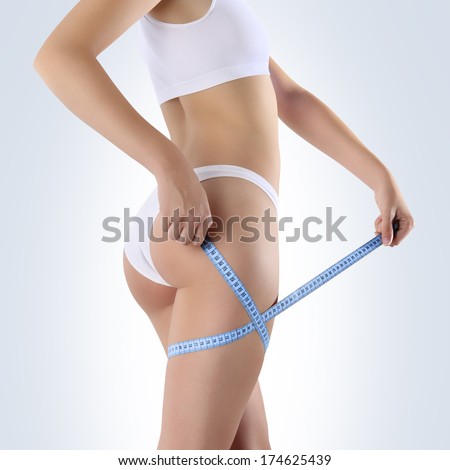 Beautiful body of woman exposing bottom and back side, Isolated on blue background