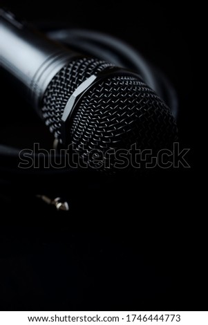 Microphone on black background. Close up. 