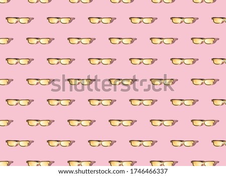 Trendy Summer Seamless pattern.Creative layout gold sunglasses on  pink background.Minimal concept.

