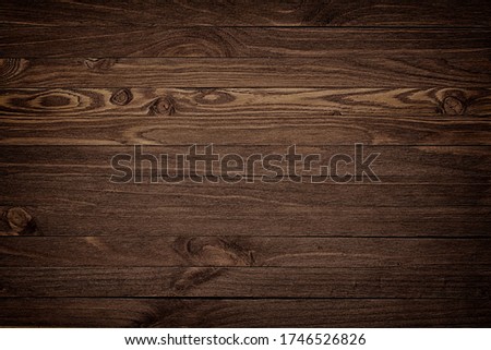 Wooden background with copyspace, brown striped timber desk, old table or floor