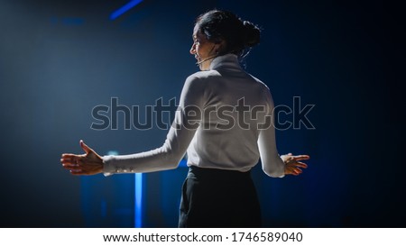 Female Motivational Speaker on Stage, Talking about Happiness, Diversity, Success, Leadership, STEM and How to Be Productive. Woman Presenter Leads Tech Business Conference. Royalty-Free Stock Photo #1746589040