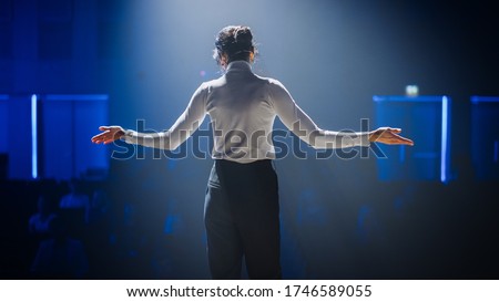 Female Motivational Speaker on Stage, Talking about Happiness, Diversity, Success, Leadership, STEM and How to Be Productive. Woman Presenter Leads Tech Business Conference. Back View Shot Royalty-Free Stock Photo #1746589055