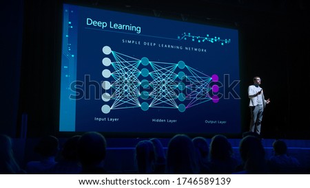 Computer Science Startup Conference: On Stage Speaker Does Presentation of New Product, Talks about Neural Networks, Shows New AI, Big Data and Machine Learning App on Big Screen. Live Event
