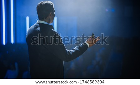 Business Conference Stage: Indian Chief Software Engineer, Startup CEO Presents New Product, Does Motivational Talk, and Lecture about Science, Technology, Entrepreneurship, Development, Leadership Royalty-Free Stock Photo #1746589304