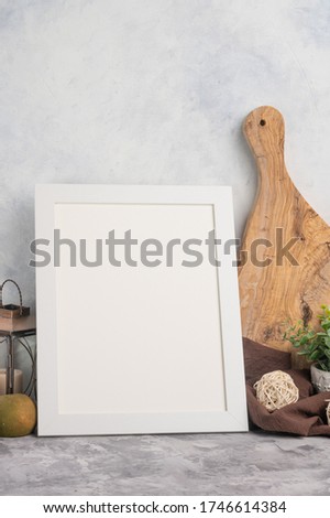 White frame on the background of the kitchen for lettering and advertising of fonts, logos, and inscriptions.
