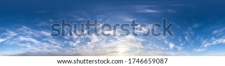 Seamless hdri panorama 360 degrees angle view blue sky with beautiful fluffy cumulus clouds with zenith for use in 3d graphics or game development as sky dome or edit drone shot