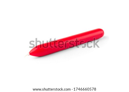 Red candle isolated on white background.