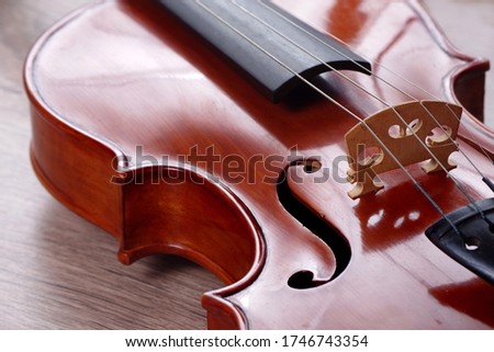violin closeup on a wooden table