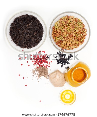 black rice, lentils and peas with spices on a white background Royalty-Free Stock Photo #174676778