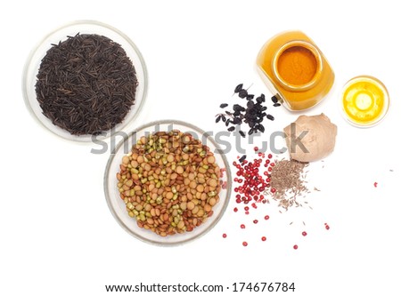 black rice and beans in glass dishes with spices on a white background Royalty-Free Stock Photo #174676784