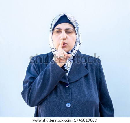Arabic muslim woman asking for silent