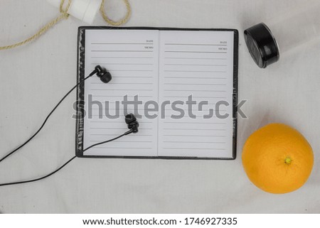 Top view of workspace with some office supplies isolated white background. Top view with copy space for input the text. The blank paper can be used to put some text or images. office equipment.
