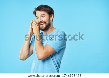 Cheerful man blue t-shirt emotions lifestyle