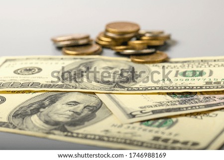 Cash banknotes and coins dollars background. Background of American money banknotes and coins.