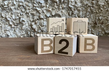 B2B, Wooden cubes with the abbreviation B2B, business and financial concept, B2B marketing . Royalty-Free Stock Photo #1747017455