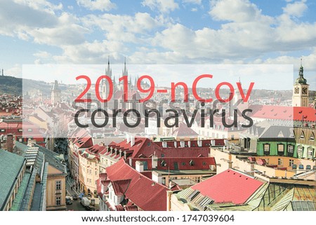 Prague view on a sunny day. Banner 2019-nCov coronovirus on city background concept coronovirus in Czech Republic