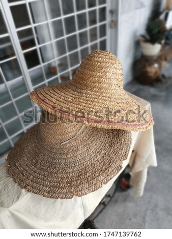 display of head protection straw hat