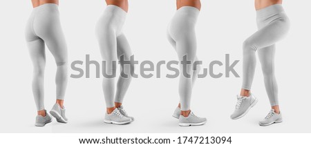 Template of white stretch leggings on a sports girl in sneakers, side view, back view, white tight pants, isolated on background. Mockup of women's clothing on slim legs, for design presentation. Set Royalty-Free Stock Photo #1747213094