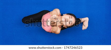 Banner of Top view Asian woman practicing yoga from home when Covid19 outbreak, healthy or Meditation Exercise, workout at home, coronavirus pandemic and quarantine, sports and healthcare in concept