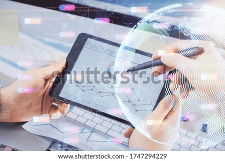 Multi exposure of man's hands holding and using a digital device and map drawing. International business concept.