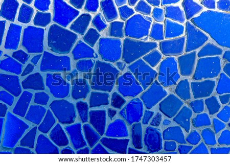 blue colorful stone mosaic tiles on the wall as background or texture,mosaic background