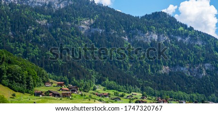 Mountains of Swiss with beautiful view. Beautiful outdoor scene near Lungern, canton of Obwalden, Switzerland. Artistic style post processed photo.