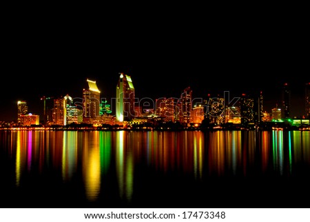 Urban San Diego City Skyline at Night reflecting off the Bay