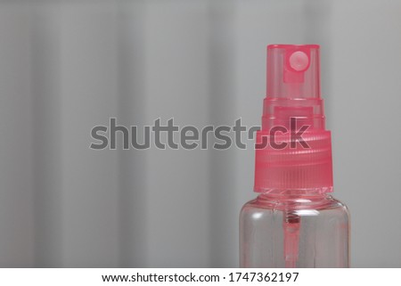Plastic bottles for cosmetics with a spray. Close-up shot.
