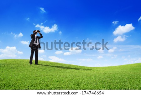 Businessman using binocular