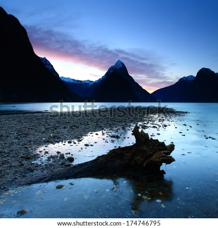 Sunset view of Mitre Peak mountains at Milford Sound, New Zealand