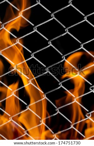 fire in a metal grid