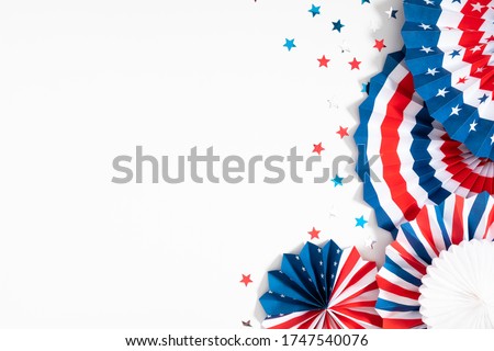 4th of July American Independence Day. Happy Independence Day. Red, blue and white star confetti, paper decorations on white background. Flat lay, top view, copy space Royalty-Free Stock Photo #1747540076