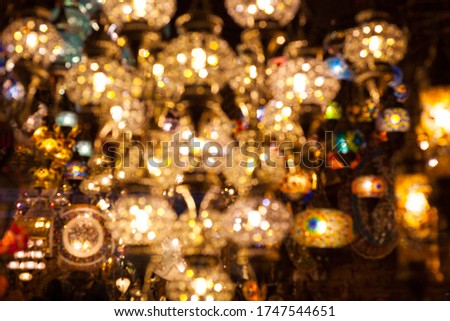 Background of Turkish traditional lights in BLUR. Blured BRIGHT background of lights. Ramadan concept. Colorful lamps in the background. 