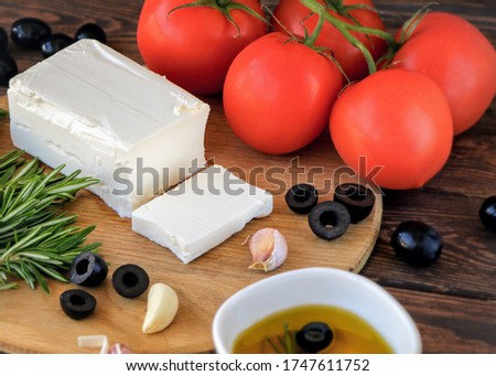 feta cheese with a torn slice