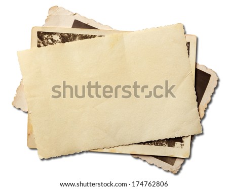 Stack of old photos isolated on white with clipping path included