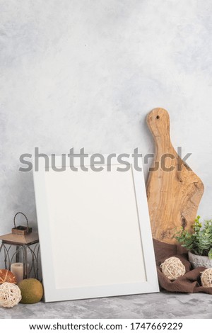 Kitchen background with empty white frame and accessories for design. Lettering and advertising menu, restaurant business, menu for cafe.
