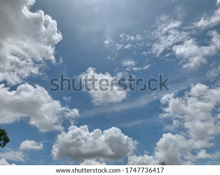 Fluffy cloudy on blue sky background