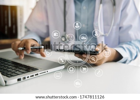 Medicine doctor hand working with modern digital tablet computer interface as medical network concept.