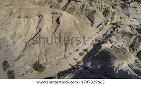 Aerial shot of desert canyon naturally desaturated colors